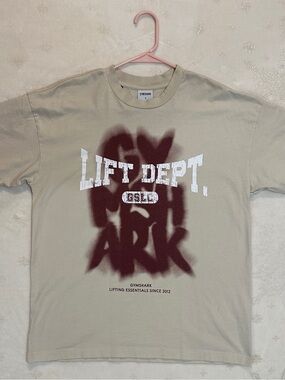 Gymshark Beige Short Sleeve Tee with Maroon Spray Graphic